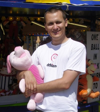 Marcin on the pier in Clacton, with his trophy - a Piglet won by throwing three cricket balls into a milk can :-)